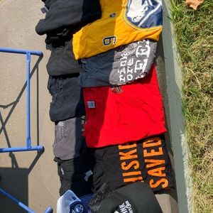 Big bundle of clothes and hats 8 shirts and 2 caps used.